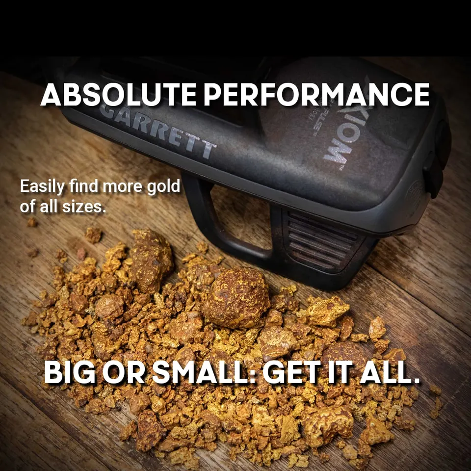 Garrett Axiom metal detector advert over a pile of gold nuggets